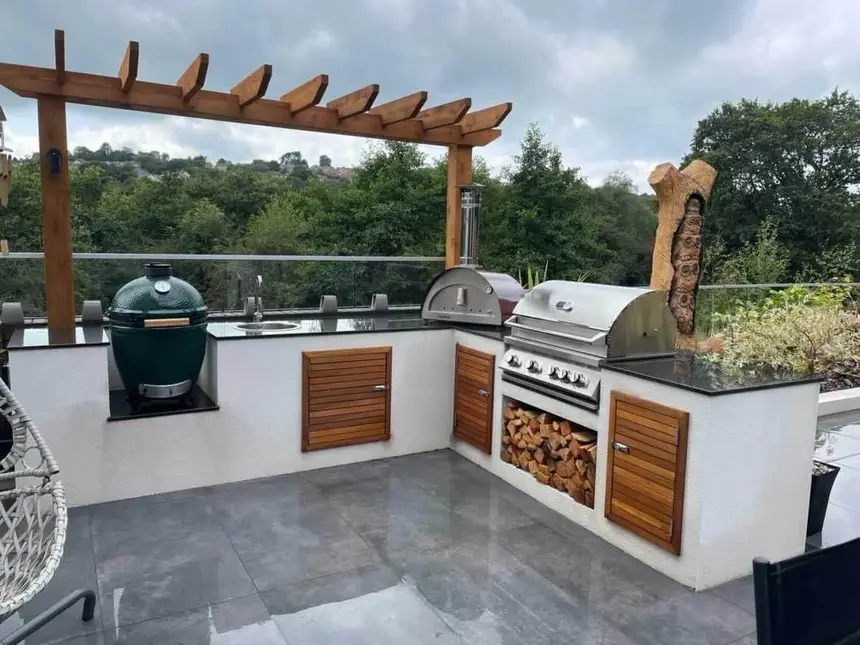 Rooftop kitchen under timber pergola — BBQ and Outdoor Kitchen project photo, Dubai