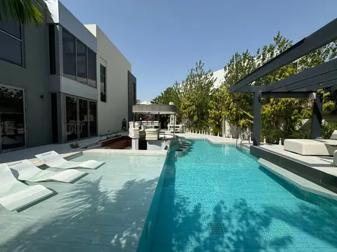 Backyard pool with sunken loungers — Green Heaven Landscape project photo, Dubai