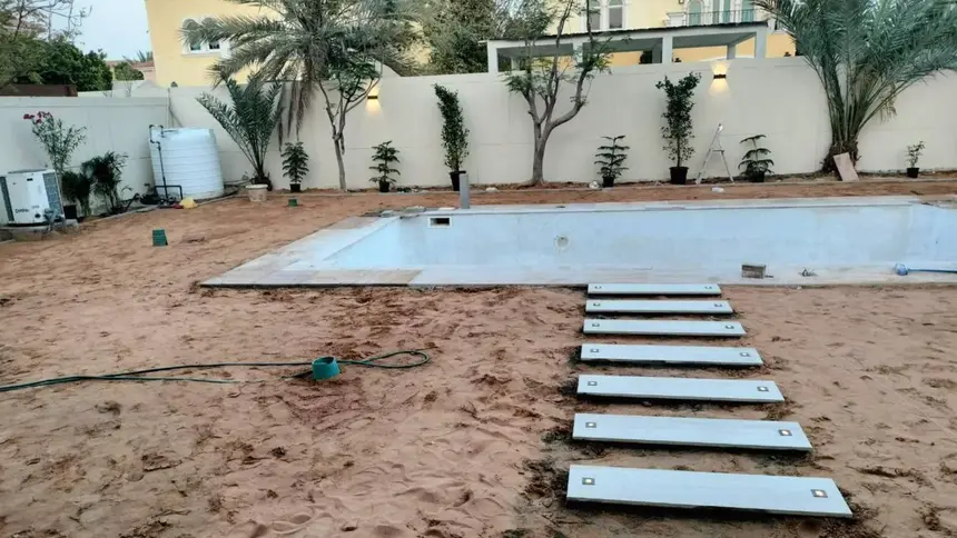 Installation crew wiring an irrigation manifold — Irrigation Systems project photo, Dubai