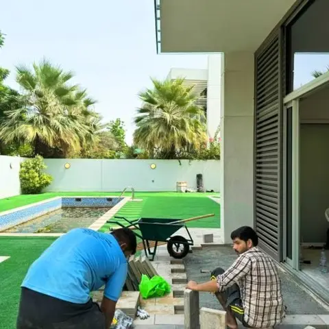 Poolside paving in progress — Green Heaven Landscape project photo, Dubai