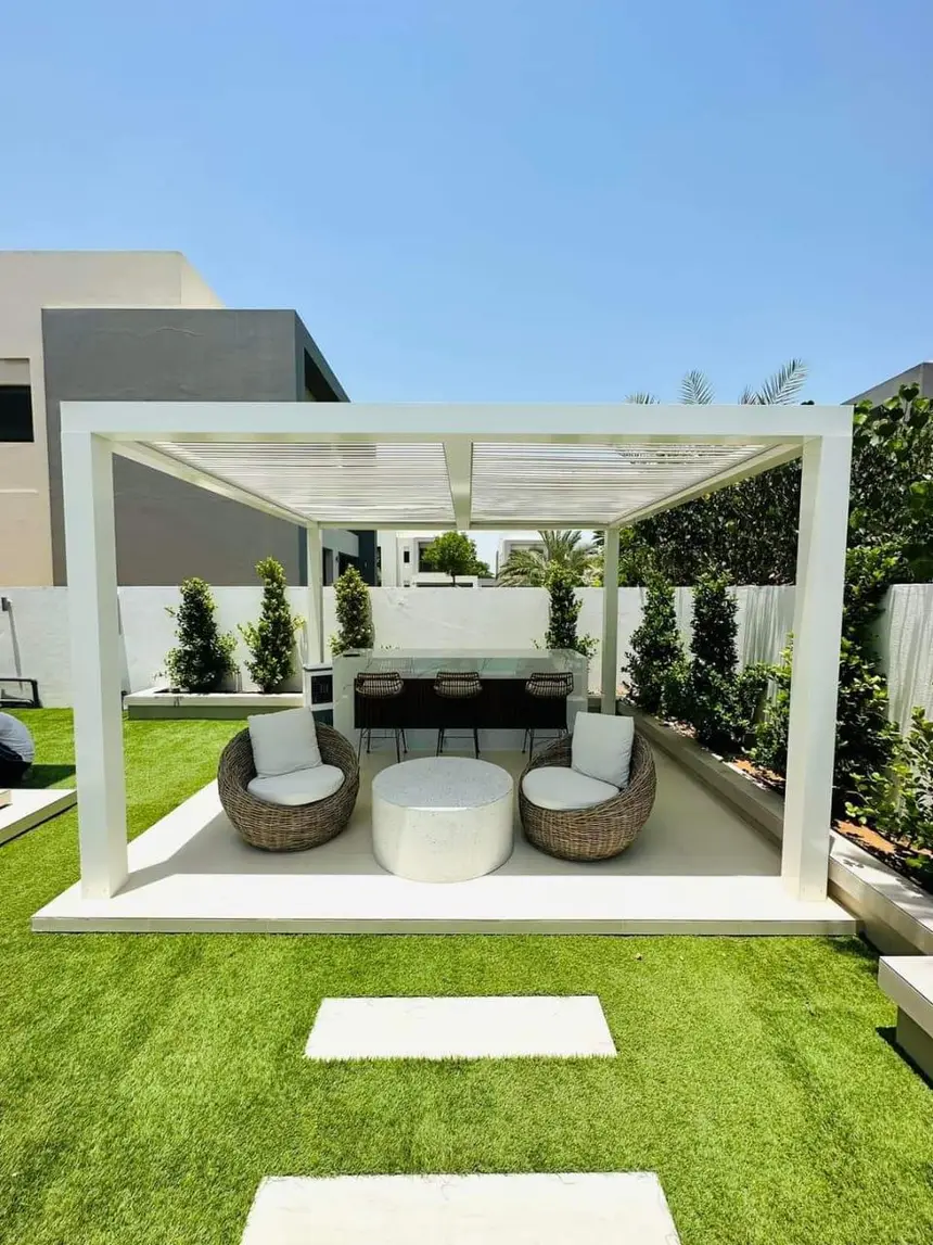 Day view of the same pergola lounge