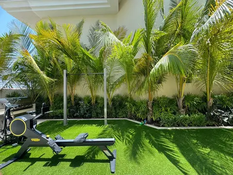 Turf lawn & outdoor gym by the pool — Green Heaven Landscape project photo, Dubai