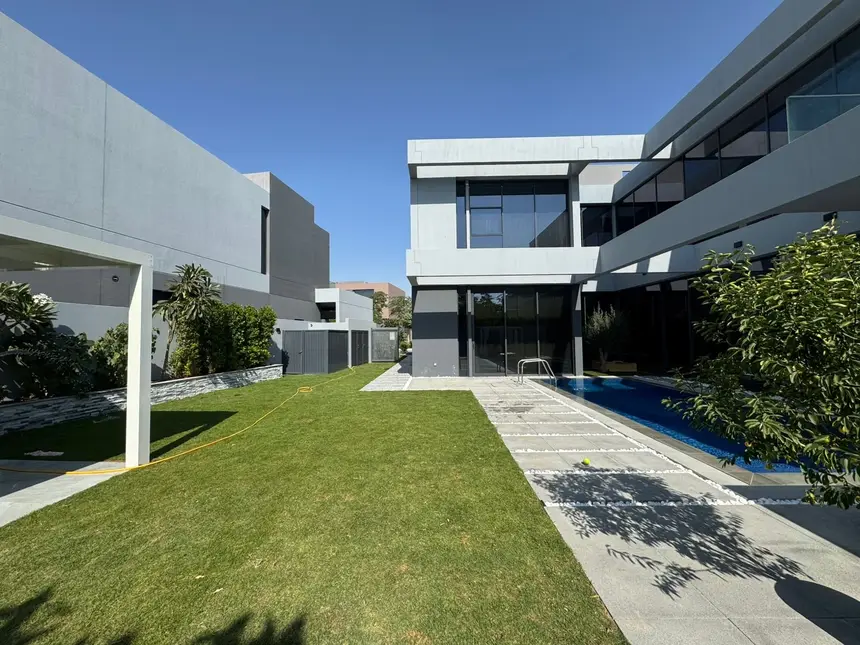 Pool courtyard beside a modern villa — Swimming Pool Construction project photo, Dubai