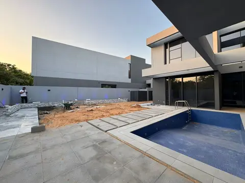 Pool edge & lawn establishing — Green Heaven Landscape project photo, Dubai