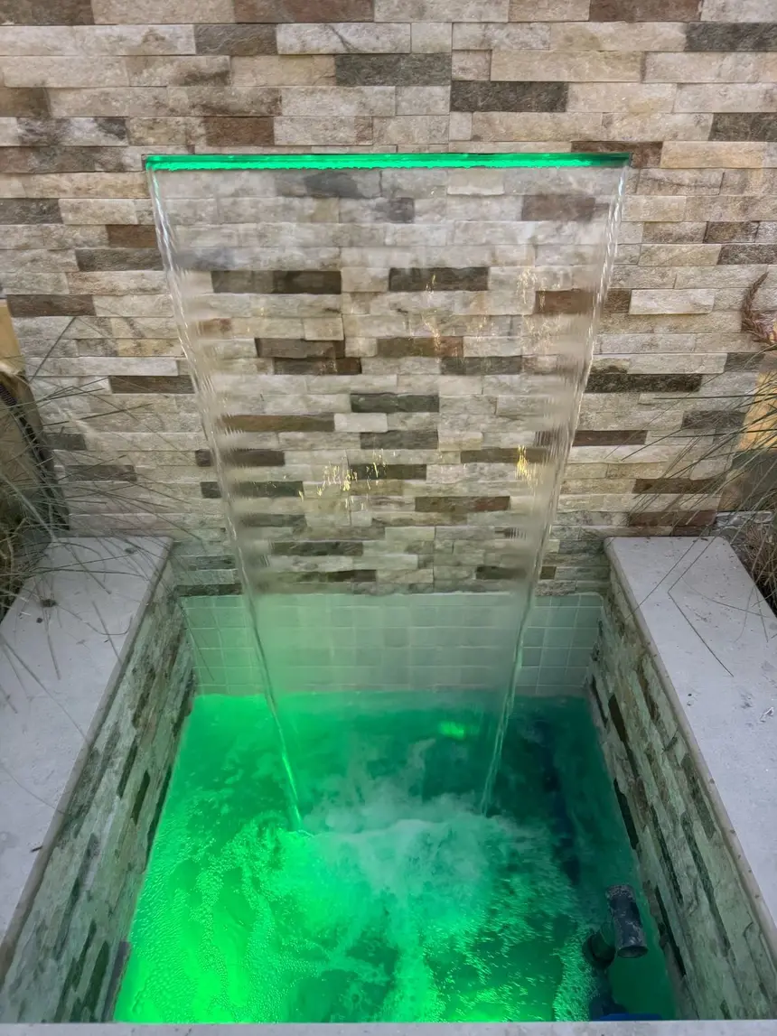 Water wall with green illumination at dusk — Fountains, Falls & Water Walls, Green Heaven Landscape project